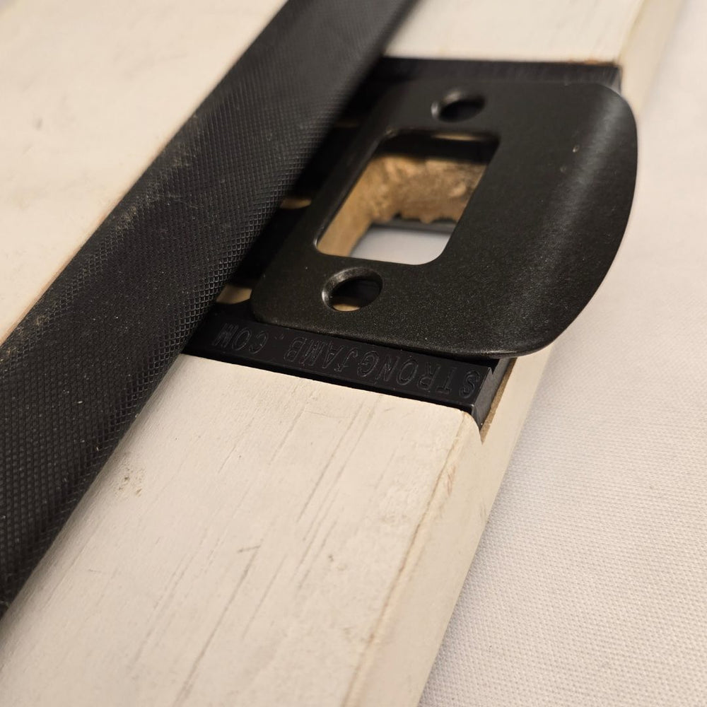 The Armor Plate set into the jamb
